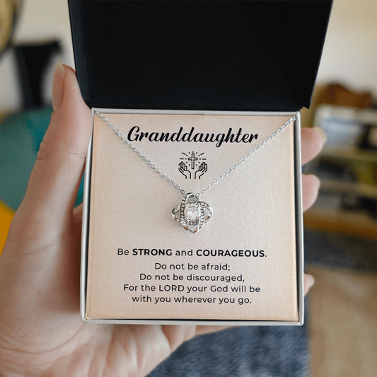 Granddaughter on her baptism necklace